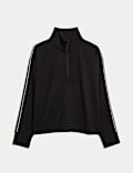 Top con media cremallera y cuello chimenea en modal