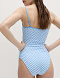 Traje de ba&ntilde;o jacquard texturizado con escote abierto