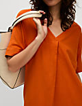 Robe midi en lin à col en V et fermeture à boutons-pression