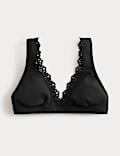 Haut de bikini ampliforme plongeant à bordure brodée