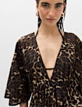 Puur katoenen bedrukte, doorschijnende kaftan met V-hals.