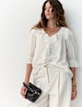 Blouse poète à col en V à volants