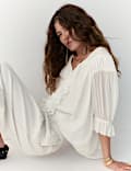 Blouse poète à col en V à volants