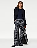 Pantalon coupe large à taille élastique et motif fleuri
