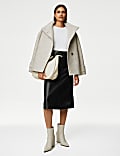 Midi-rok met A-lijn in leren look met zoomdetail