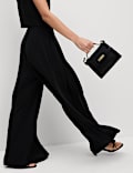 Pantalon taille haute à pinces