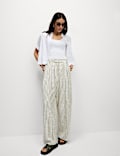 Pantalon coupe large à pinces en lin mélangé à rayures