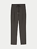 Pantalón tapered al tobillo con cordón ajustable