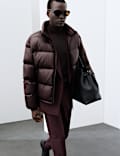 Veste molletonn&eacute;e matelass&eacute;e, garnie de plumes et de duvet