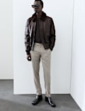 Cazadora bomber de piel con cuello de piel de borreguito