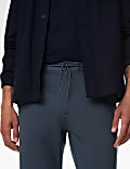 Pantalón tapered elástico de sarga