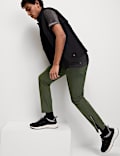Pantalón deportivo con bolsillos con cremallera y cordón ajustable elásticos