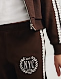 Pantalon de jogging coupe large &agrave; motif brod&eacute; et bordure en dentelle (du 6 au 16 ans)