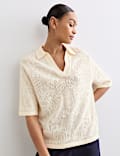 Polo shirt van pure merinowol met pointelle-structuur