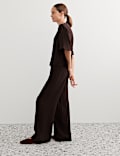 Pantalon textur&eacute; coupe large &agrave; rayures