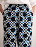 Broek van katoenmix met wijde pijpen en Ginham-stippen