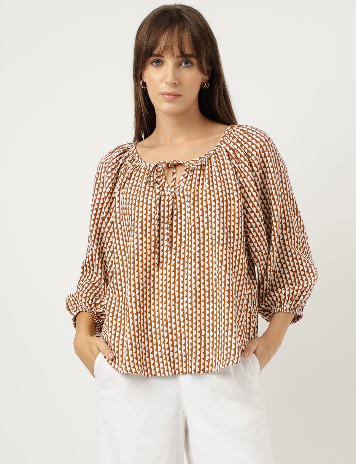 

Marks & Spencer Linen Mix Printed Tie-Ups Neck Top (FEMALE, BROWN MIX, 12)