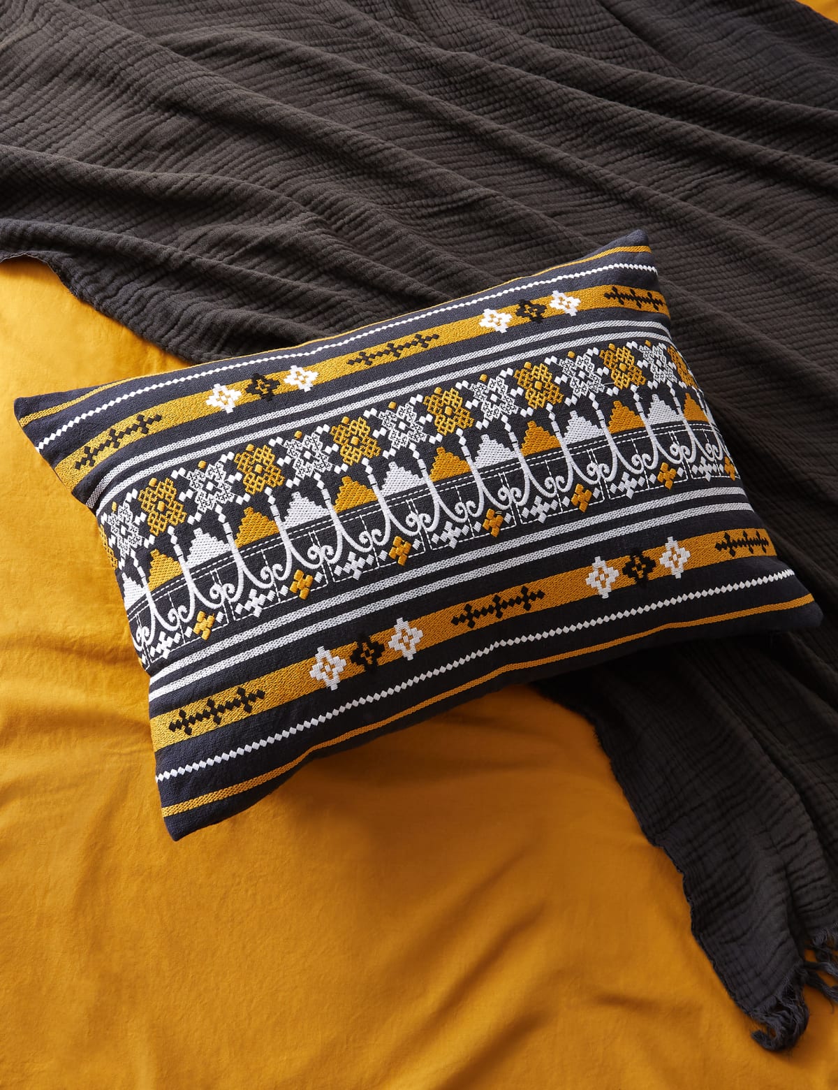 

Marks & Spencer Casablanca Collection Marabout Bolster Cushion (CHARCOAL)