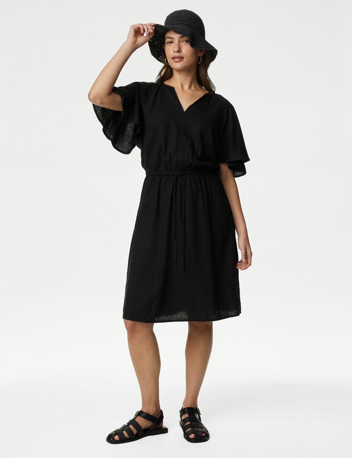 

Marks & Spencer Linen Blend V-Neck Knee Length Swing Dress (FEMALE, BLACK, 14-SHT)