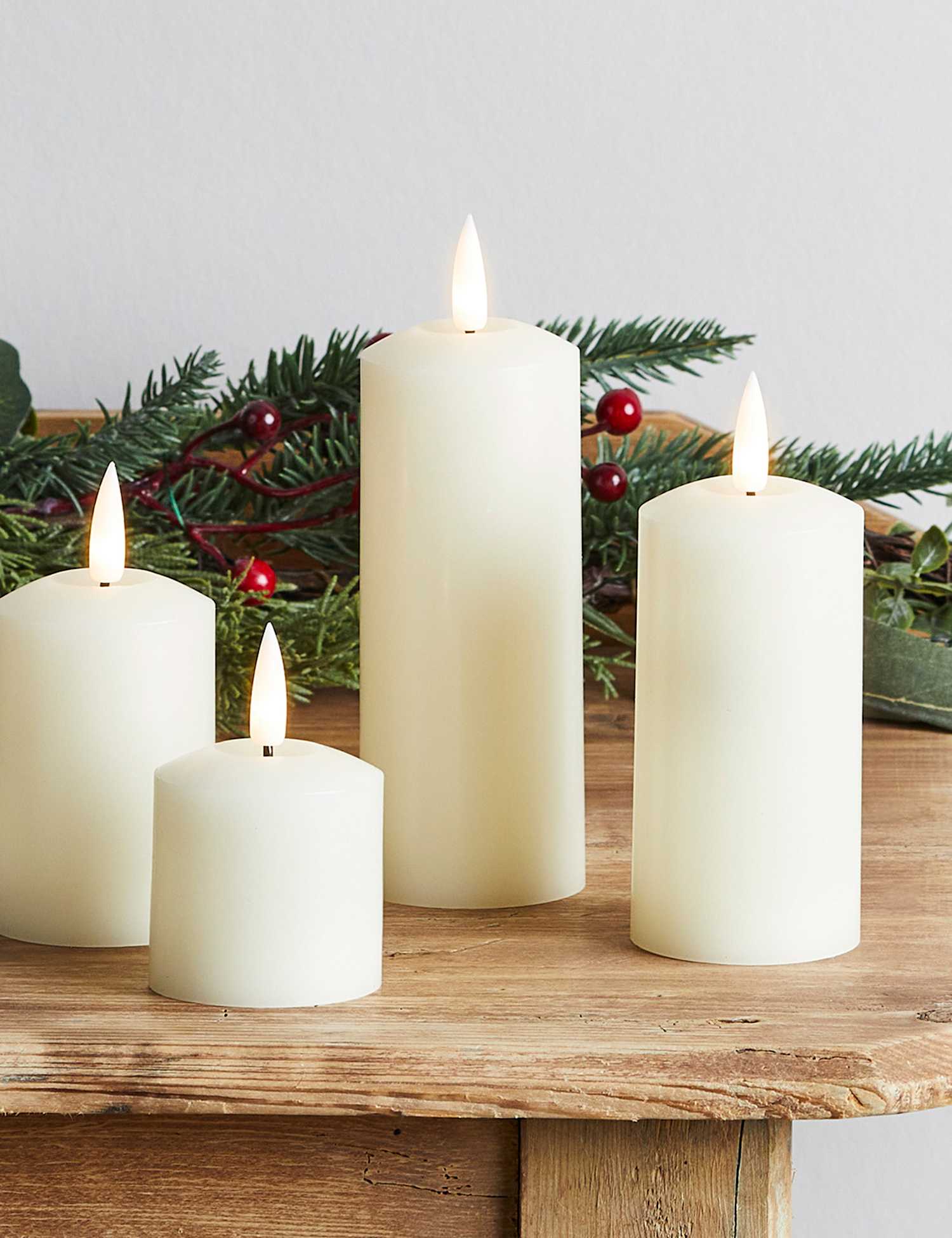 Lights4fun Set of 4 TruGlow� Pillar LED Candles Ivory