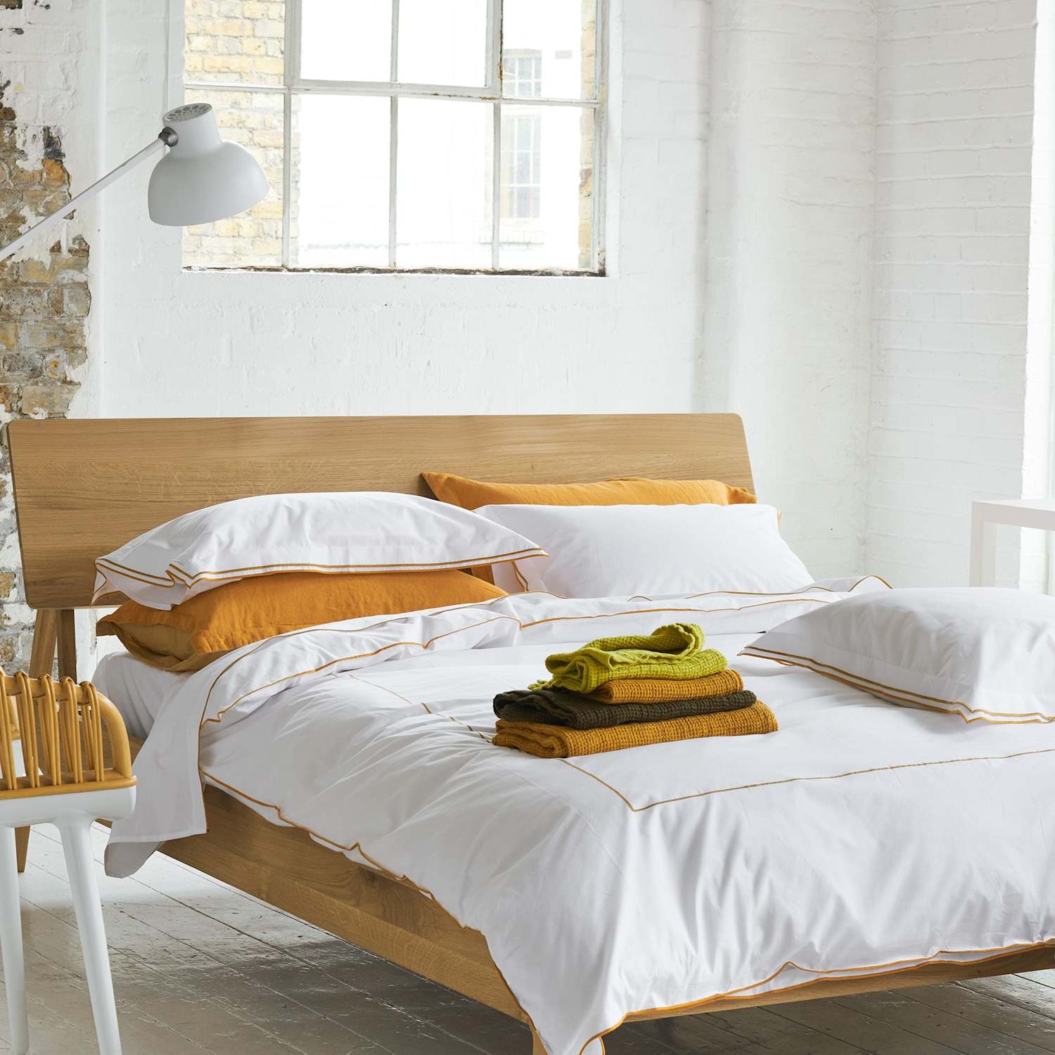 Designers Guild 2 Pack Pure Cotton Astor Pillowcases - Yellow Mix - Available at M&S