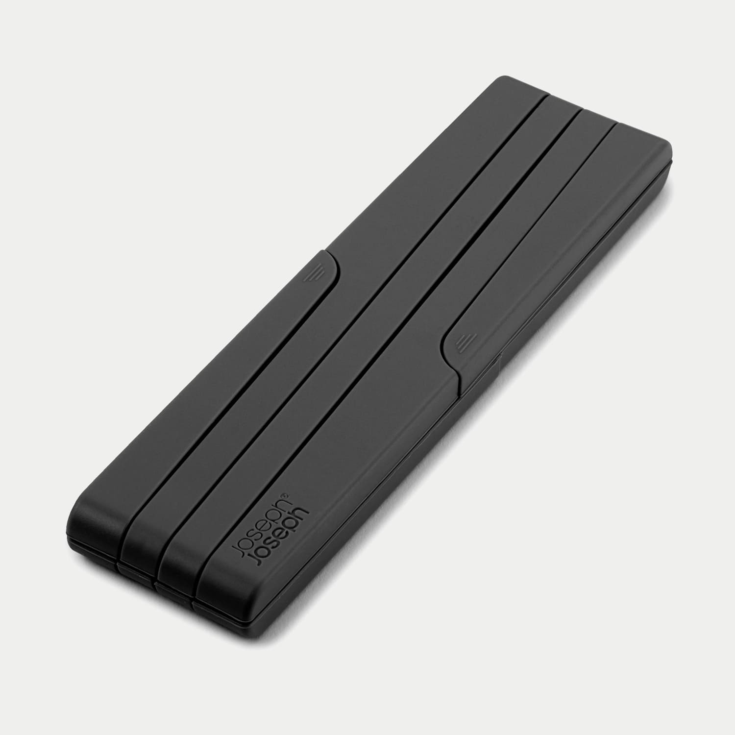 Joseph Joseph Men's Stretch Silicone Pot Stand - Black - Available at M&S