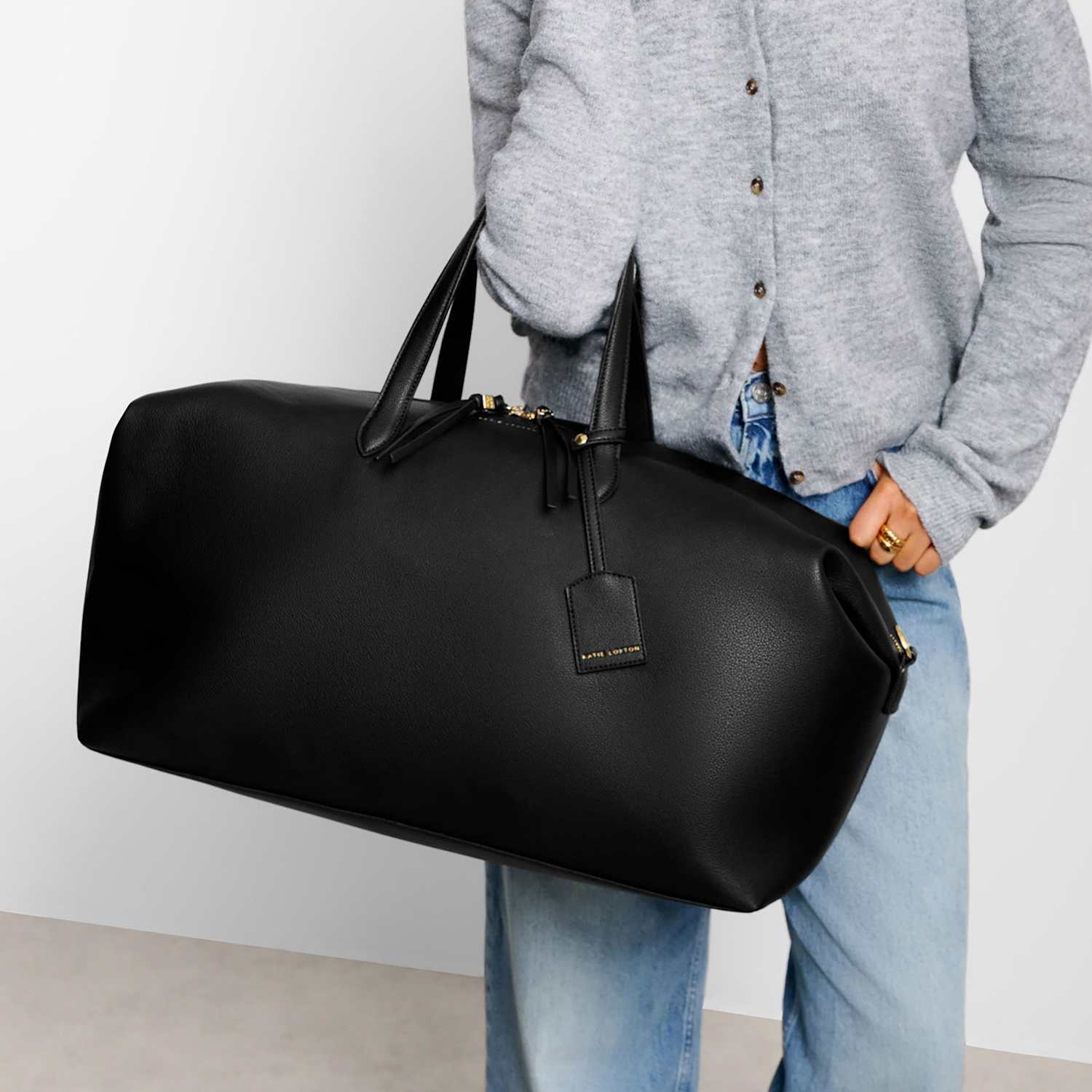 Katie Loxton Women's Faux Leather Padded Top Handle Weekend Bag - Black - Available at M&S