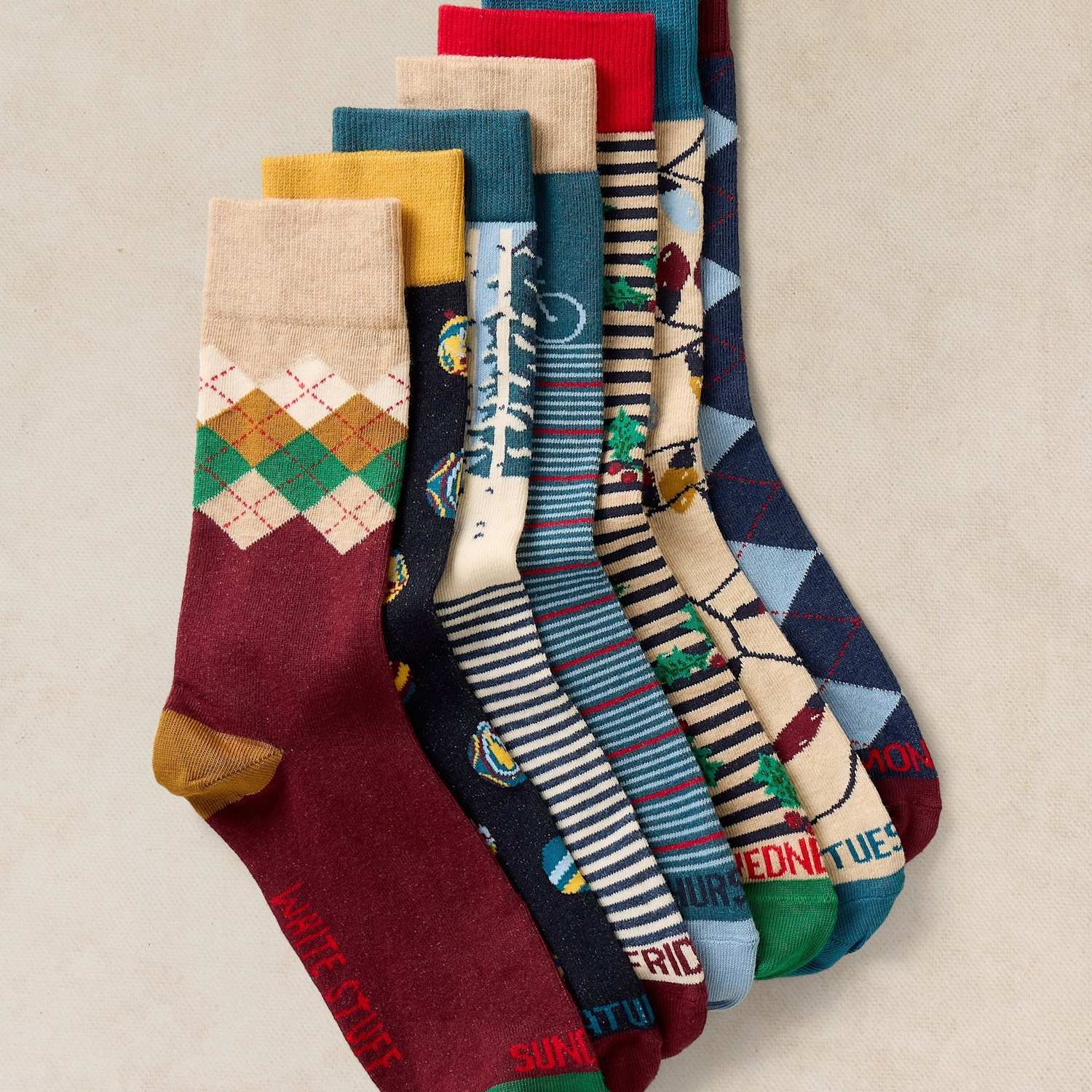 White Stuff Men's 7 Pack Christmas Days Of The Week Socks - 7-9 - Blue Mix - Available at M&S