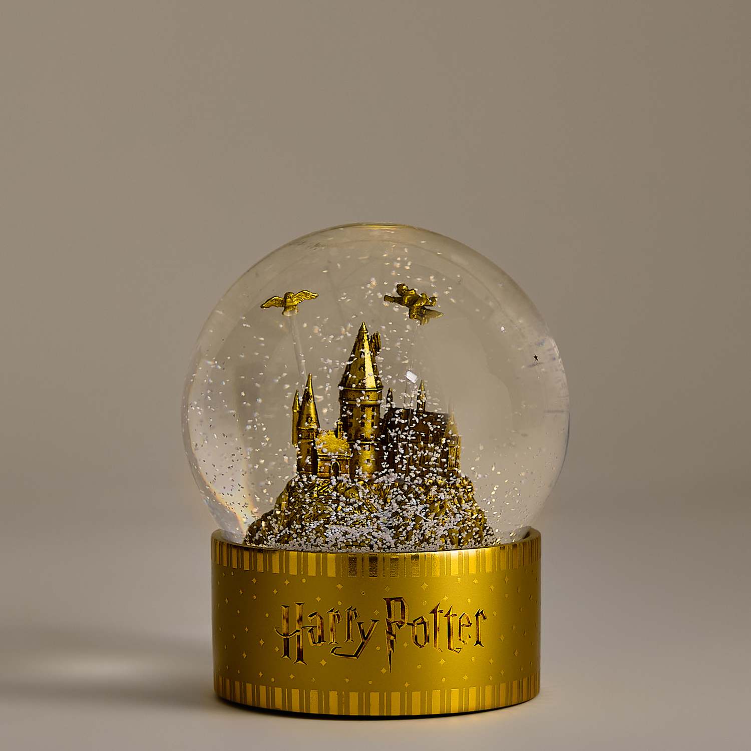 M&S Harry Potter Hogwarts Light Up Extra Large Snow Globe - Gold Mix