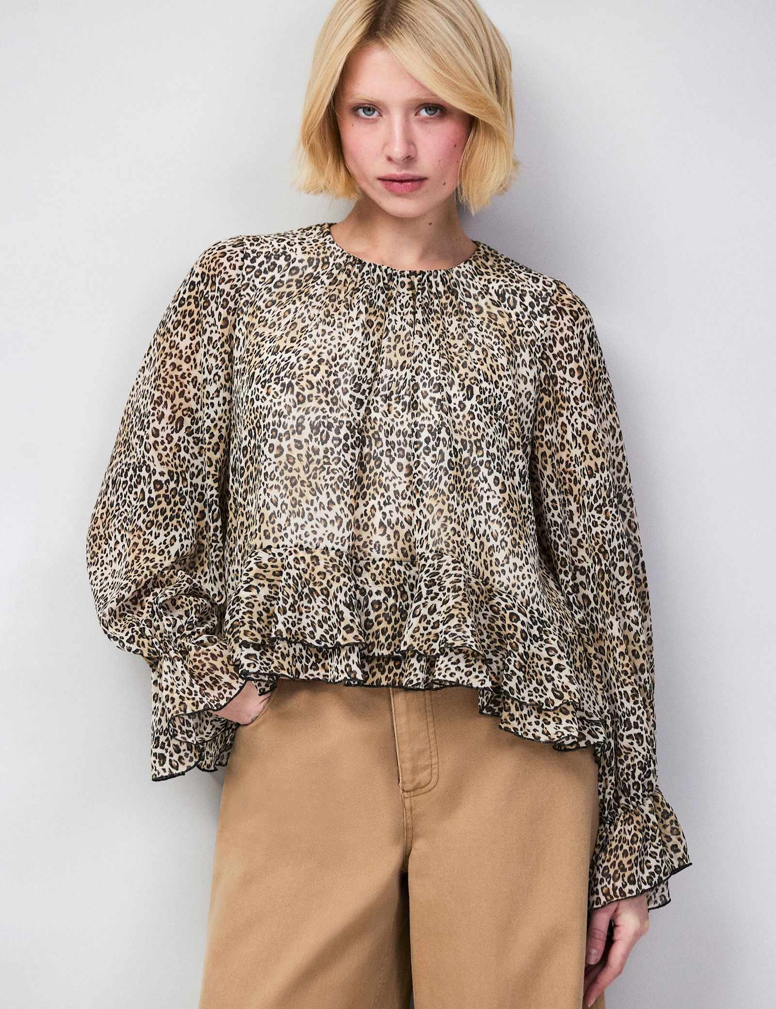 Leopard Print Round Neck Ruffle Hem Blouse - image 1