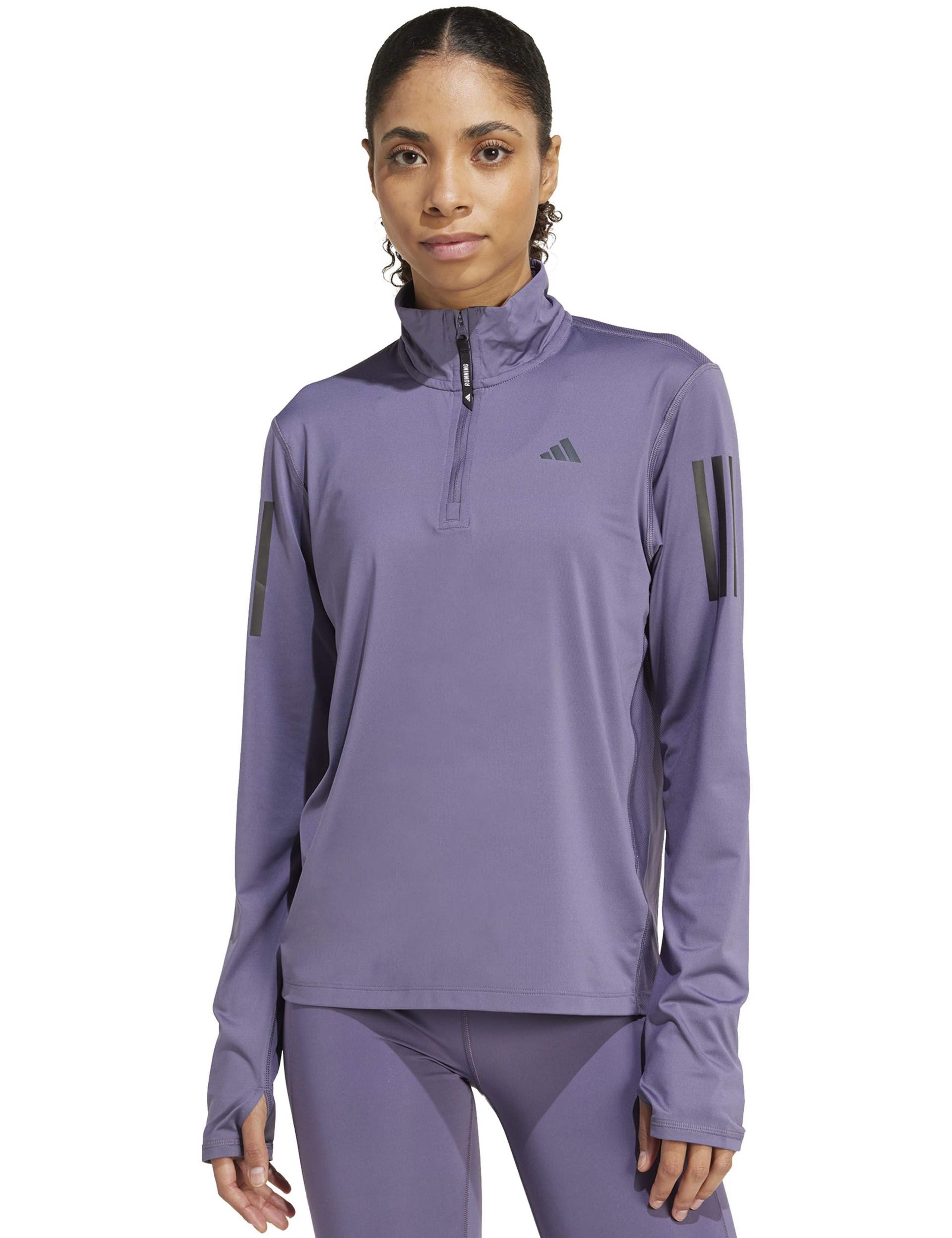 Own the Run Half Zip Long Sleeve Top
