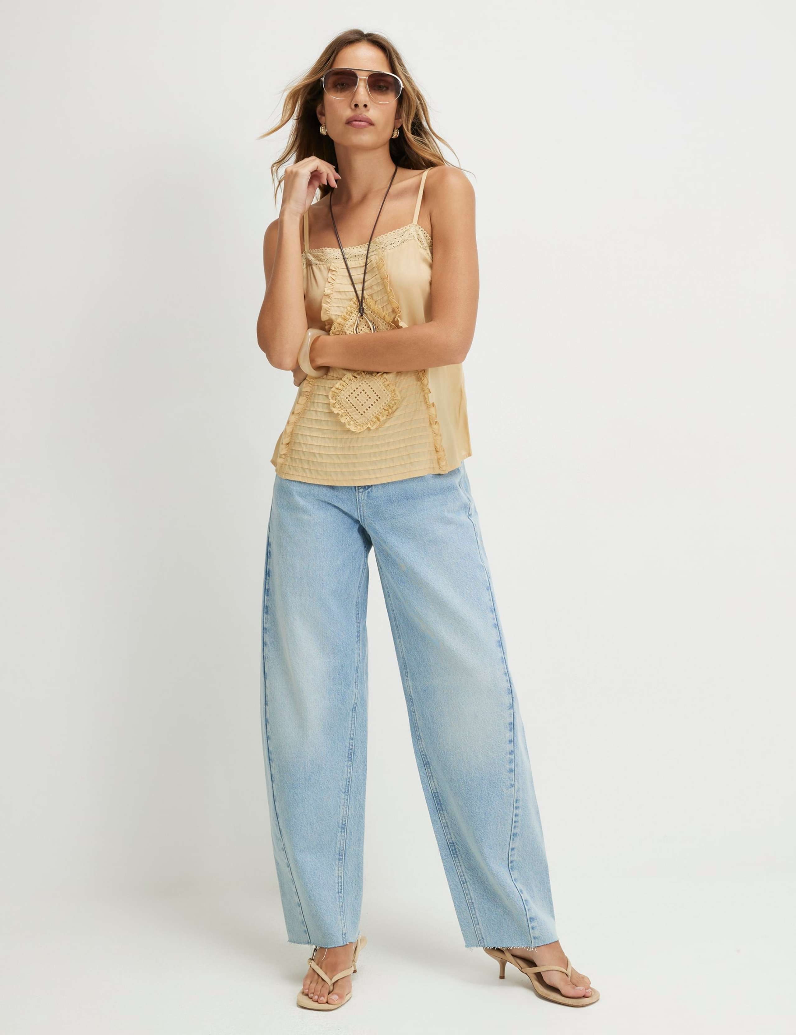 Twist Seam Raw Hem Barrel Jeans