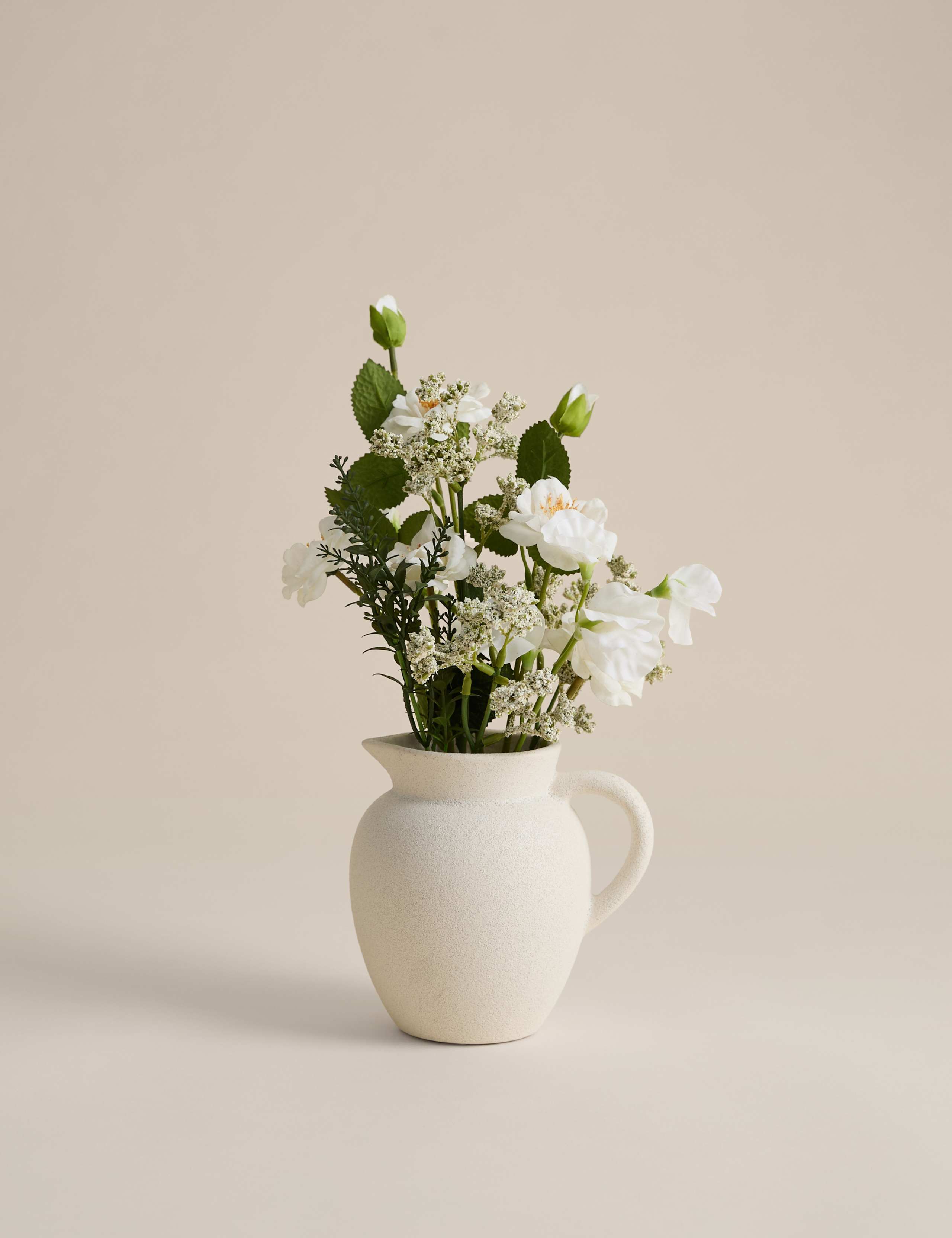 Artificial Floral Arrangement in Ceramic Jug