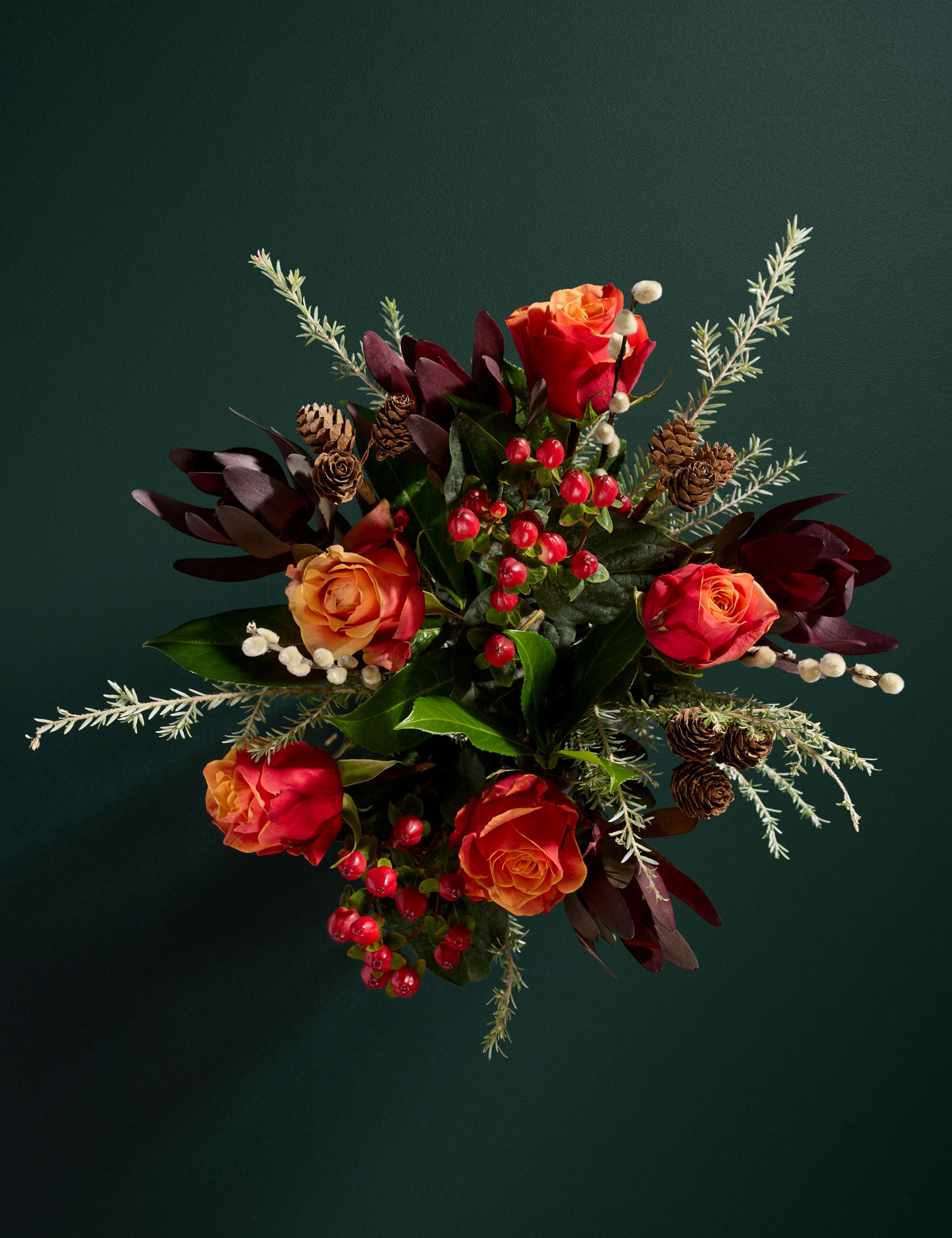 Orange Rose & Festive Foilage Bouquet (Delivery from 26th November)