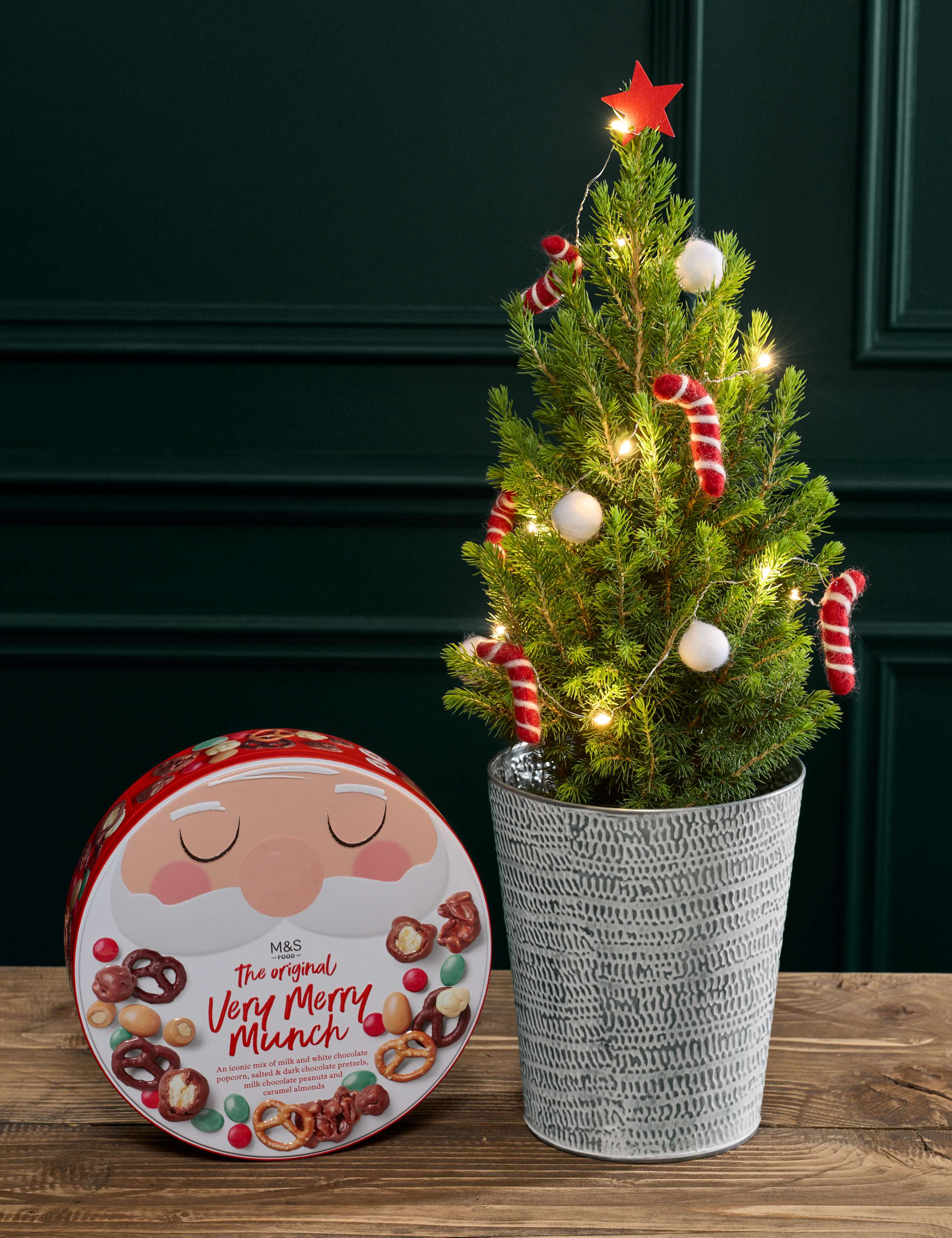 White Decorated Christmas Tree with Merry Munch Tin