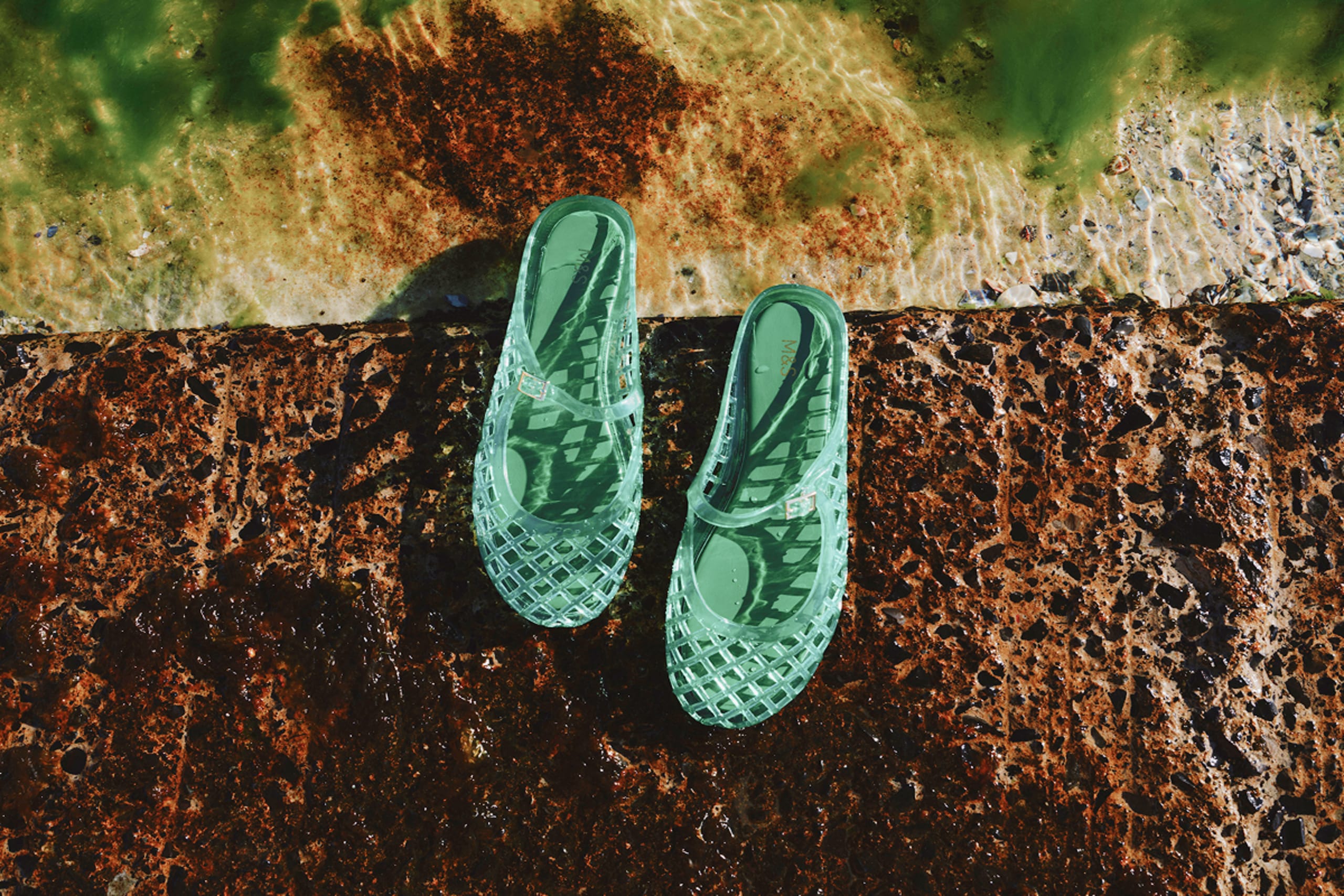 Mint flip flops on a wall