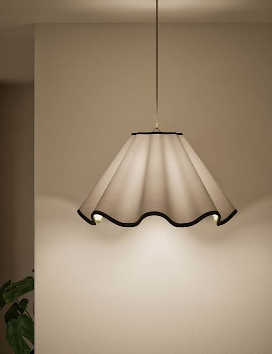 Stoffen kap met golven en schulprand