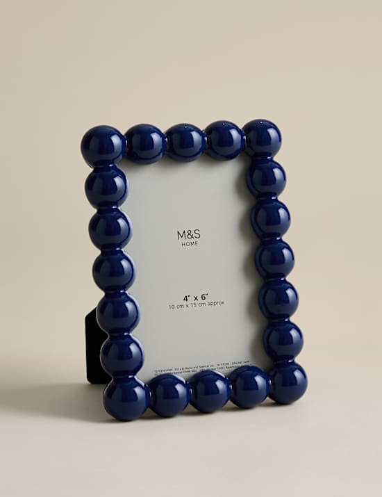 מסגרת תמונה בעיטור כדורים 13x18 ס"מ