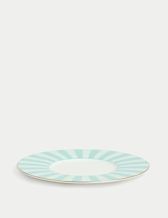 Taza y platillo de porcelana fina a rayas