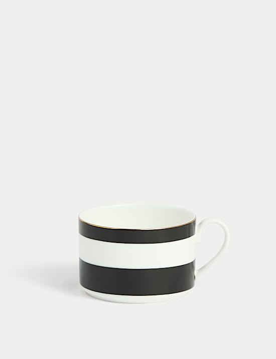 Tasse et soucoupe en porcelaine à rayures