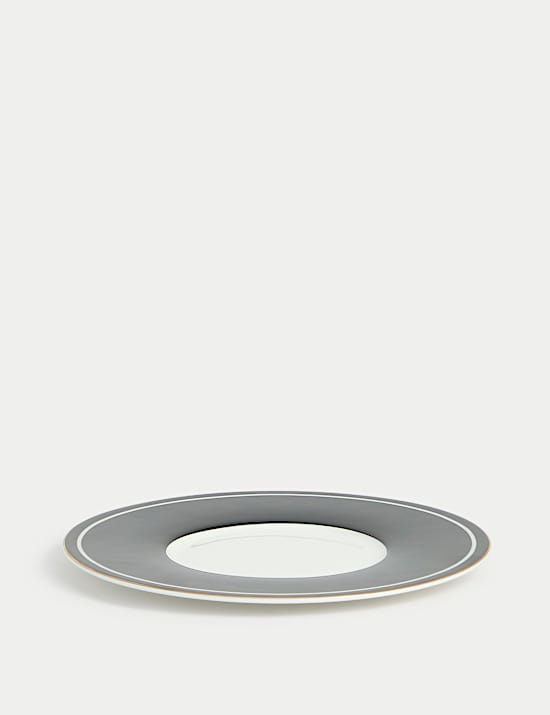 Tasse et soucoupe en porcelaine à rayures