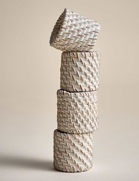 Set van 4 rotan servetringen