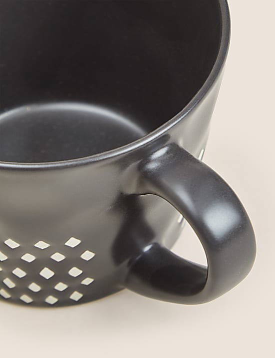 Mok met wax-coating en structuur