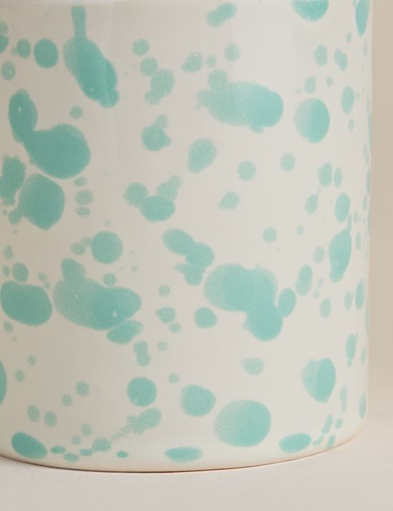 Taza con salpicaduras