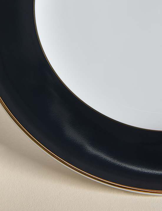 Maxim Essteller mit goldfarbenem Rand