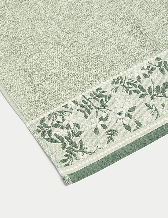 Serviette pur coton tiss&eacute; &agrave; motif fleuri