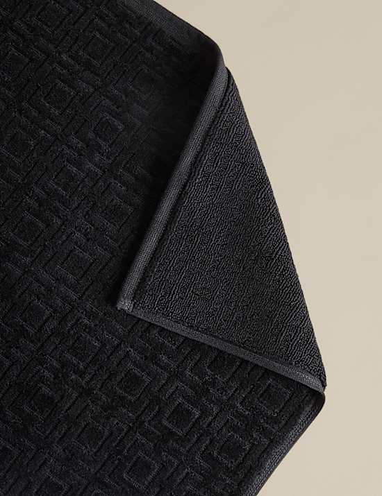 Zuiver katoenen badmat van velours met geometrisch motief