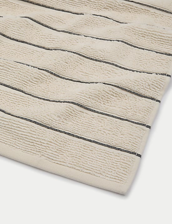 Serviette 100 % coton texturé à rayures