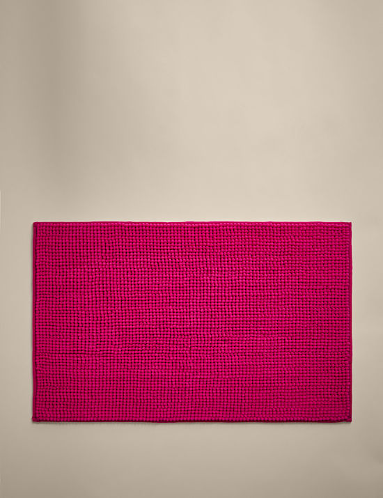 Tapis de bain à pompons
