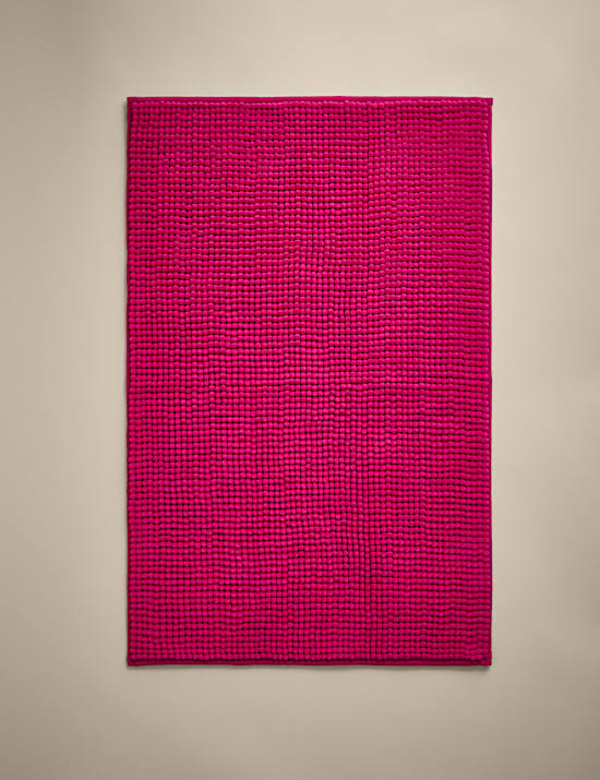 Tapis de bain à pompons